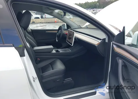 2023 Tesla Model Y Awd/Long Range Dual Motor All-Wheel Drive z USA, uszkodzony, nr VIN 7SAYGDEEXPA103691